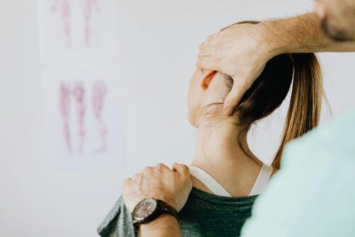Doctor Examines Woman Back Doctor Examines Woman Back